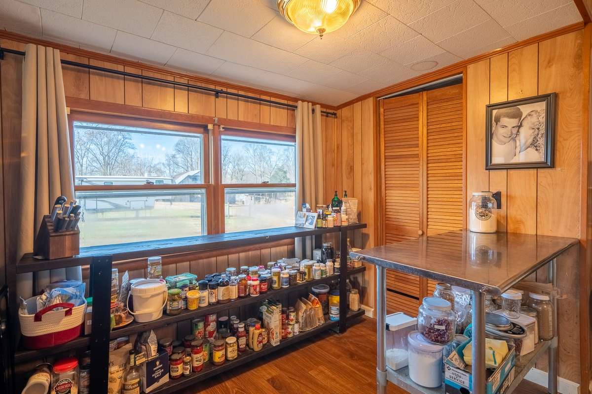 Farmhouse Dining area used as storage