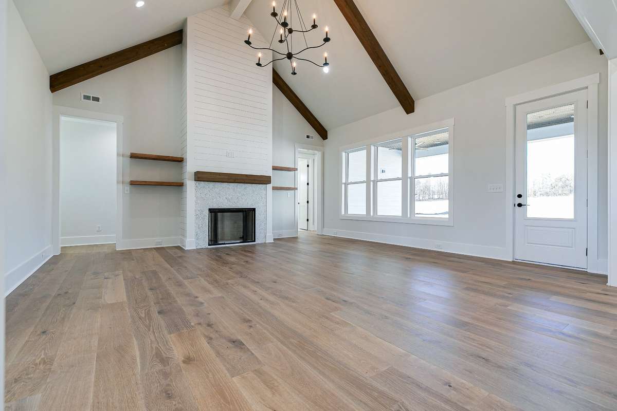 Additional available option to have stained wooden beams on the vaulted Living Room ceiling