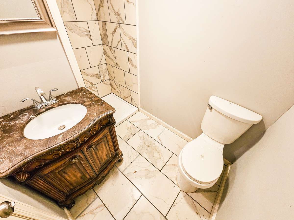 Master Full Bath with tile flooring