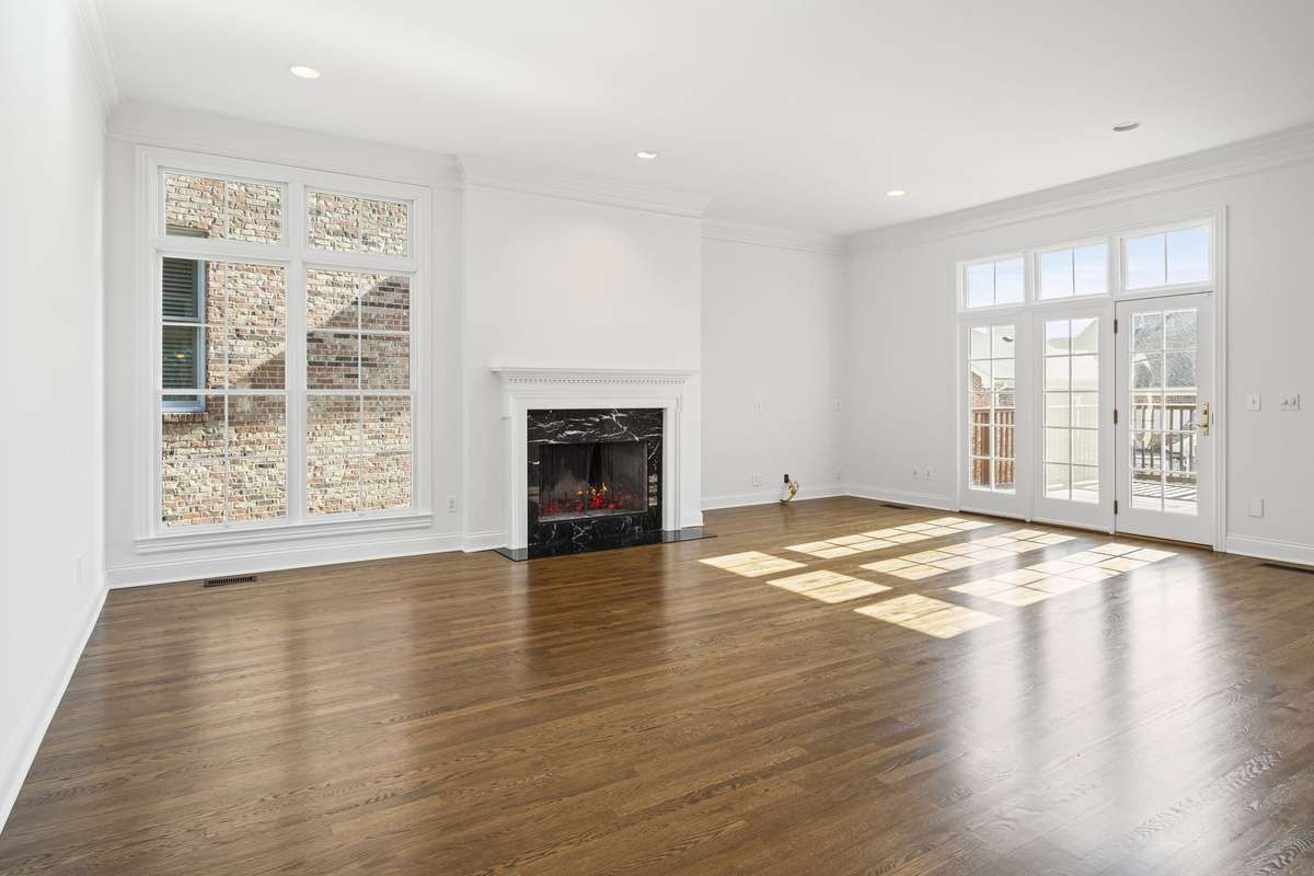Loads of light flow into the great room. Gas fireplace with marble surround. Access to your deck with a brand new gas grill to enjoy dinner and relaxation.