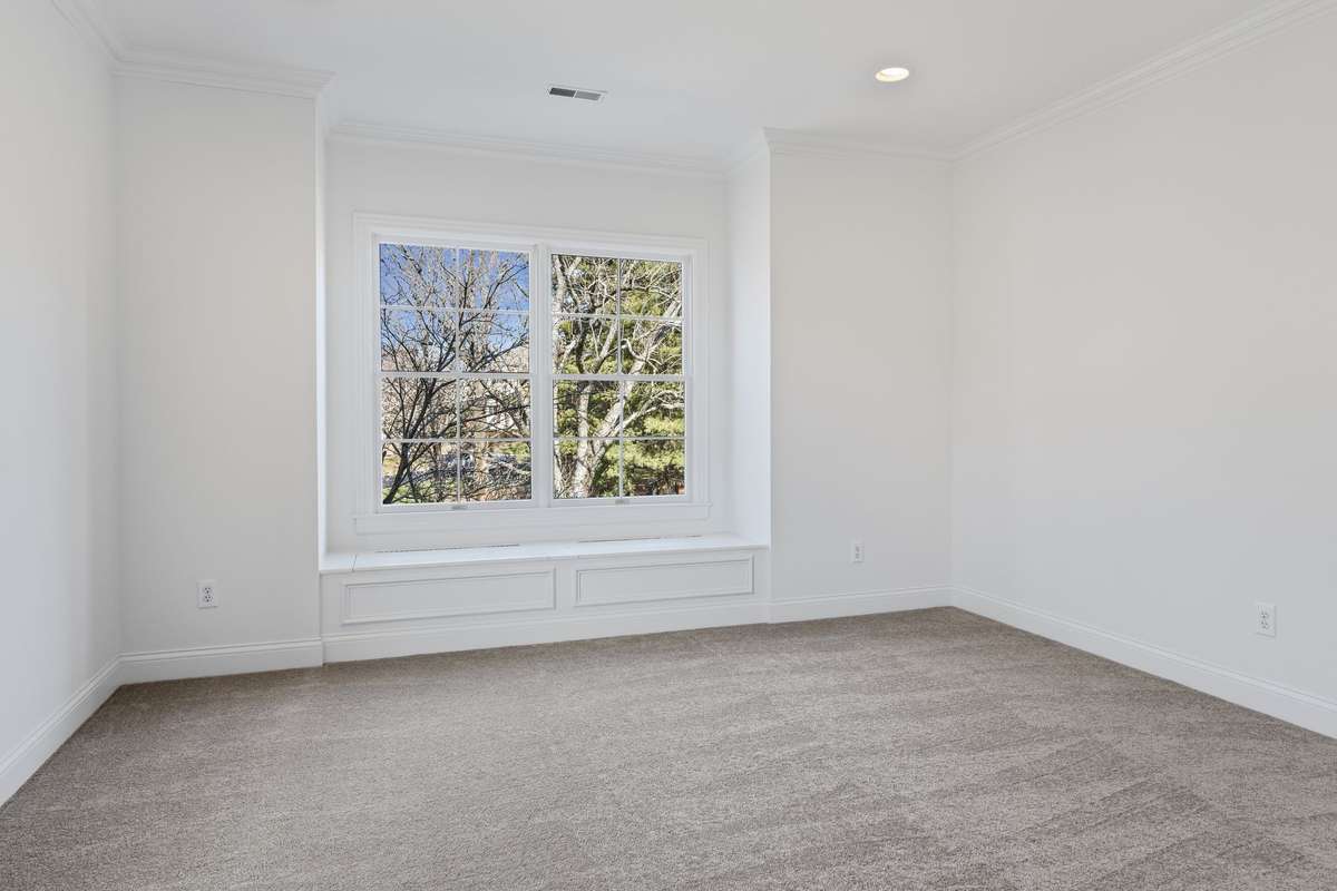 Upstairs bedroom #1 with brand new carpet throughout the upstairs.