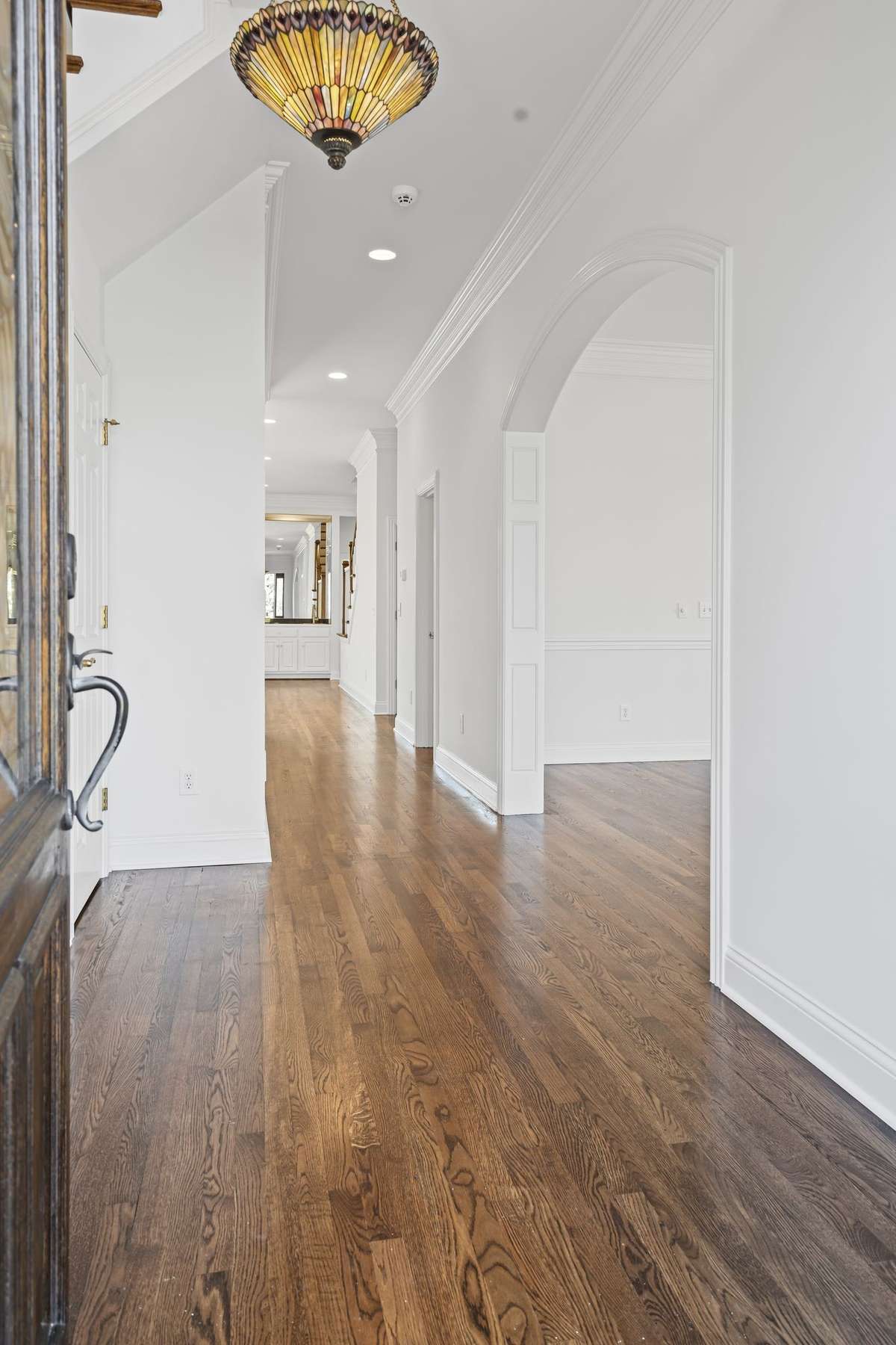 Welcome to your new home, 46 Green View. Light-filled entry way leads you into your oasis. Look at these floors!!