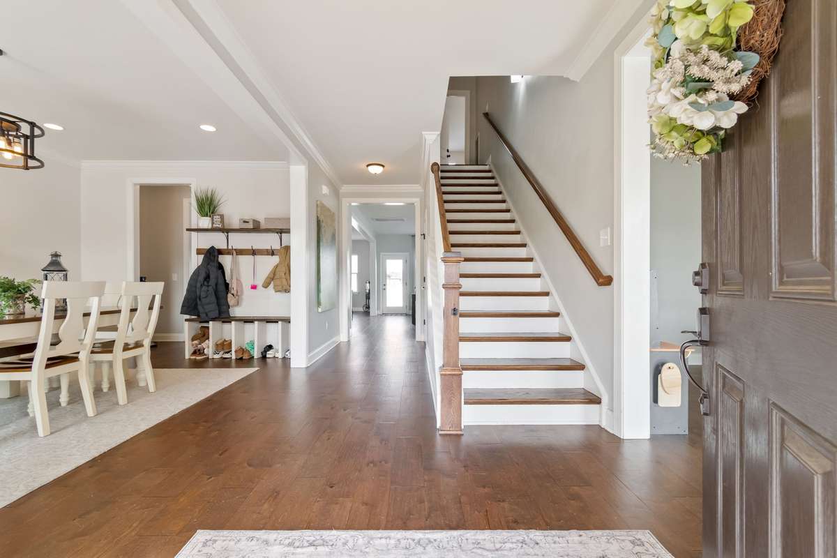 The hardwood floors, neutral paint and beautiful wood trim featured in this home add to it's charm and elegance.