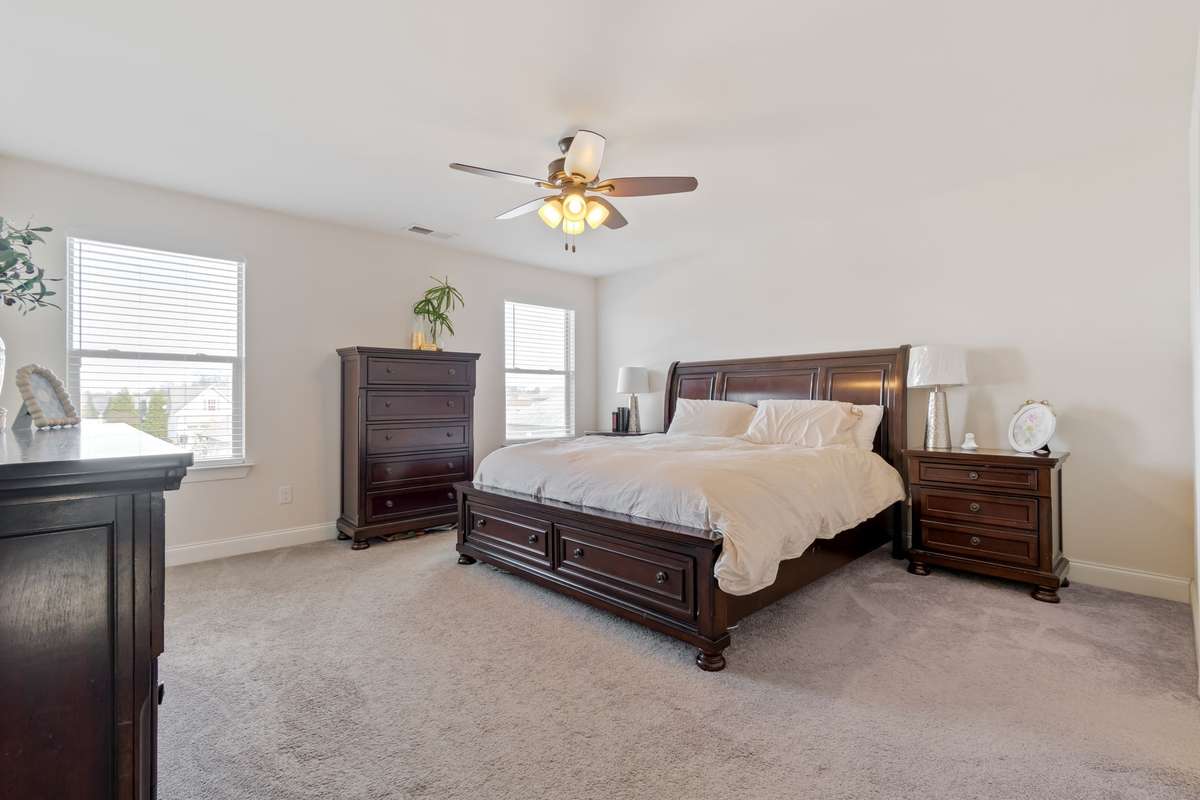 The primary suite is spacious and private. With a walk- in closet and it's own en suite bathroom this room provides a nice and quiet retreat.