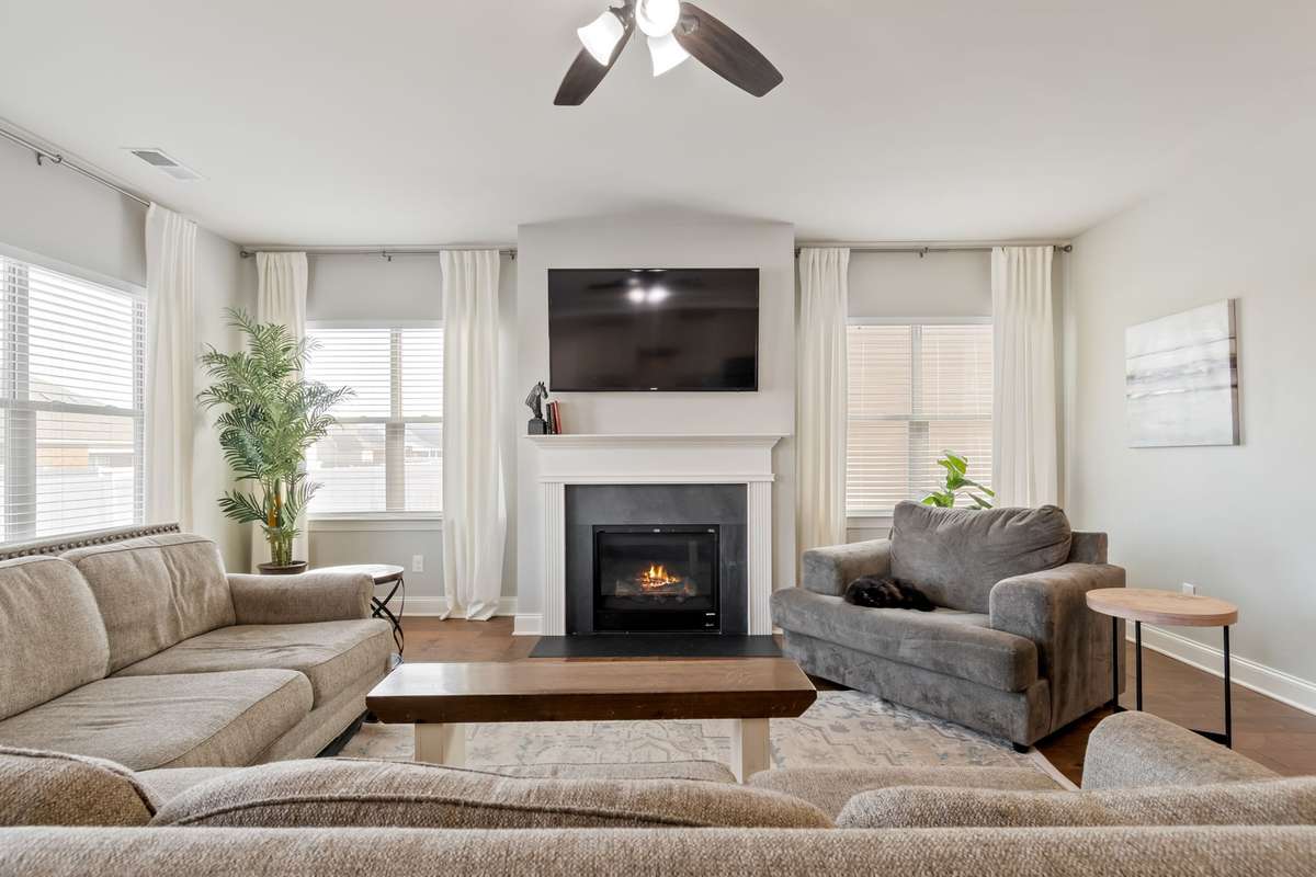 Gather near the fire on a cool winter evening and enjoy this large living room.