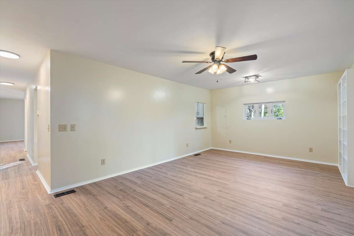 *DEN WITH BUIL-IN BOOKCASES AND OPENS INTO THE FLORIDA ROOM*