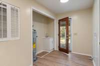 *SIDE ENTRY DOOR FROM CARPORT WITH A LARGE WALK-IN MUDROOM/LAUNDRY ROOM + SINK*