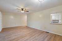 *ADD A BANQUETTE AT THE POCKET WINDOW LEADING INTO THE KITCHEN AND CREATE ANOTHER DINING SPACE*