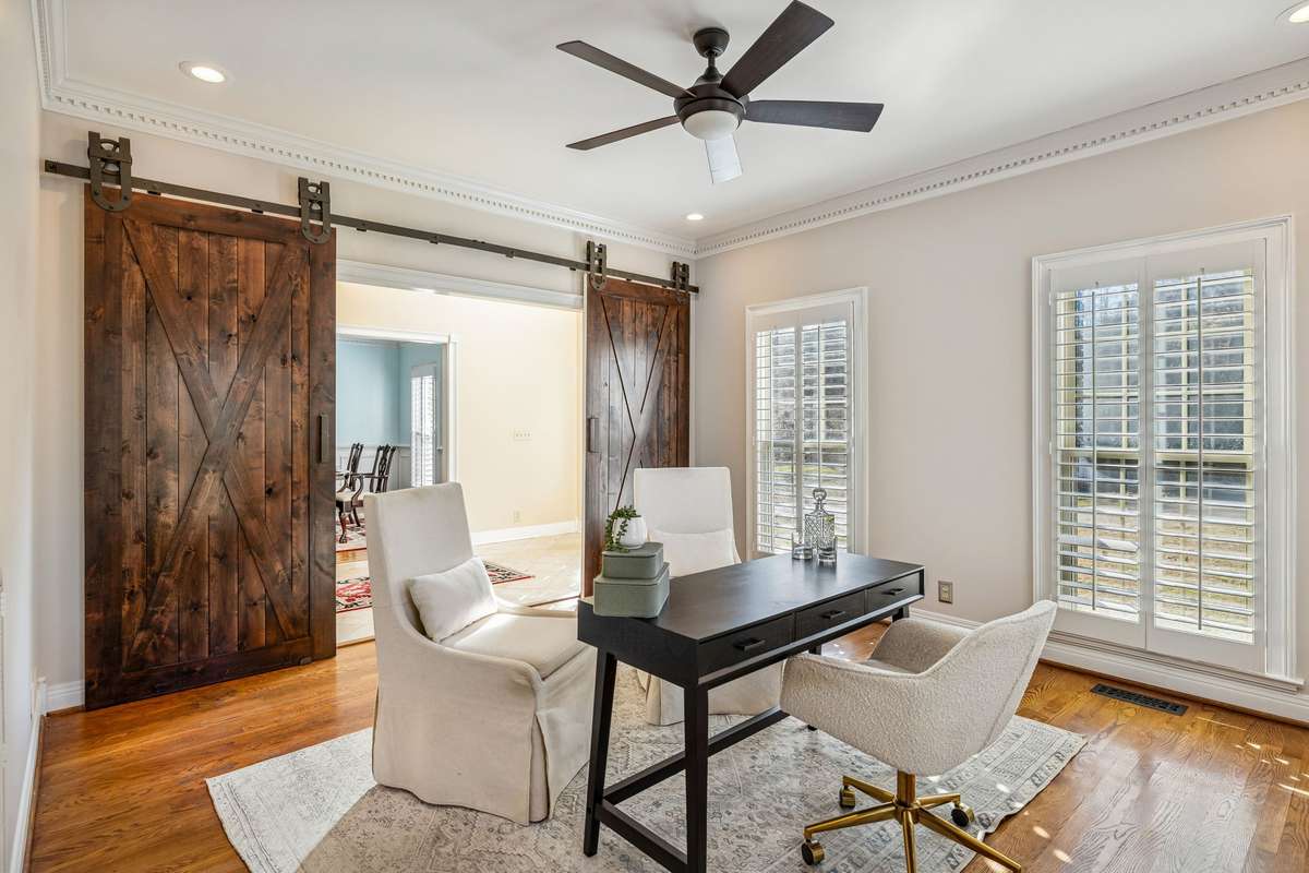 Have you been hoping for a home office with picturesque views of the Tennessee Hills? This is the office for you. Looking out the windows, you'll see the tree-filled hill with a flowing creek at the base and occasional deer, turkey, and more.