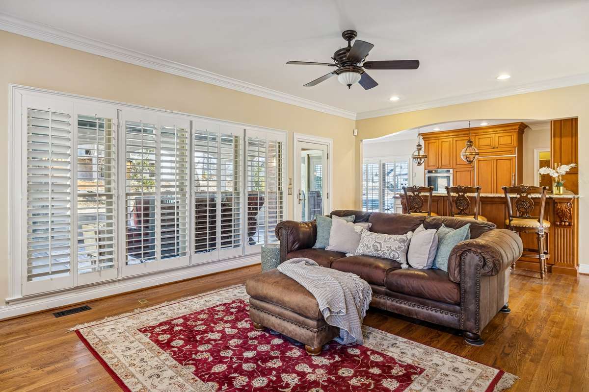 The large windows lining the living room allow the natural light and outdoor living space to flow into the home!