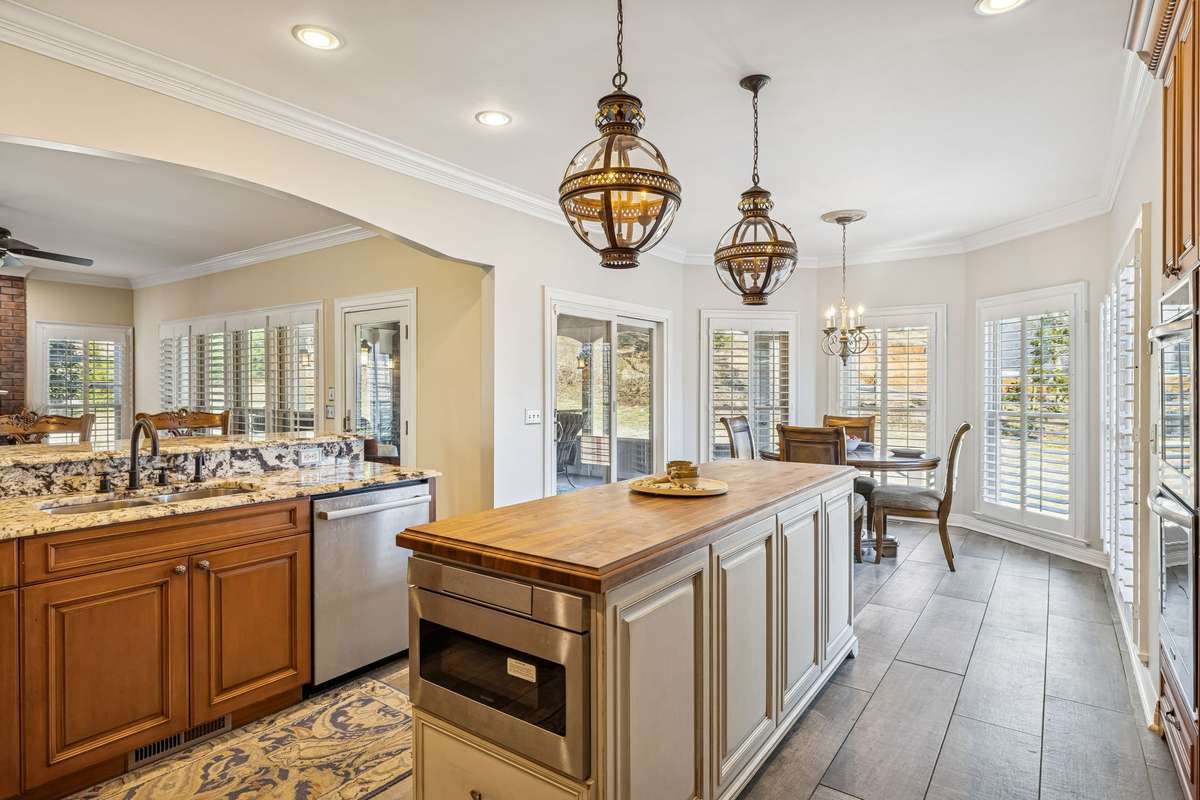 Having both a breakfast bar and an eat-in kitchen allows for the inclusion of all your family's needs. While the openness of this home lets everyone feel connected.
