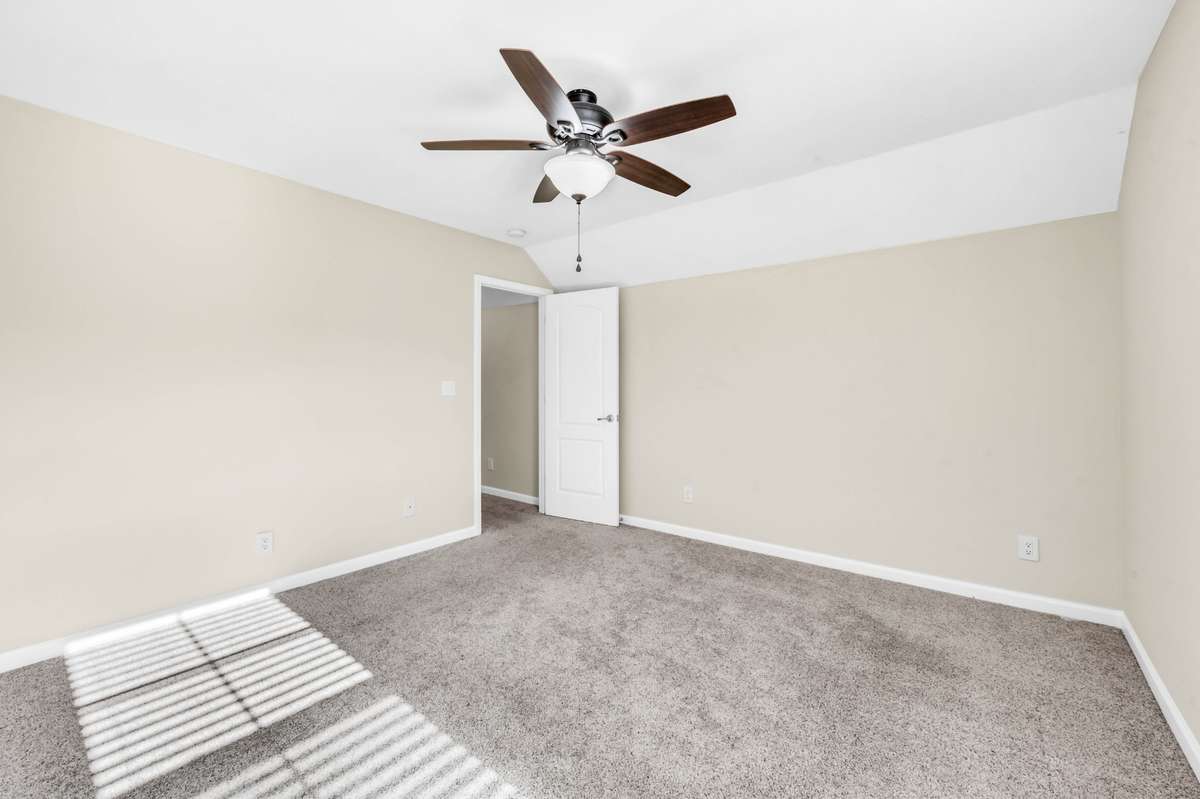 Bedroom 3 is located upstairs