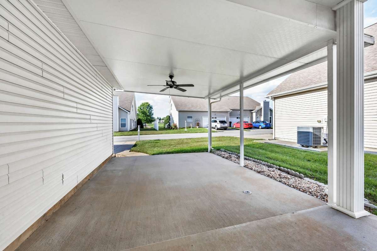 Step out back to a private, covered patio—perfect for relaxing or entertaining.