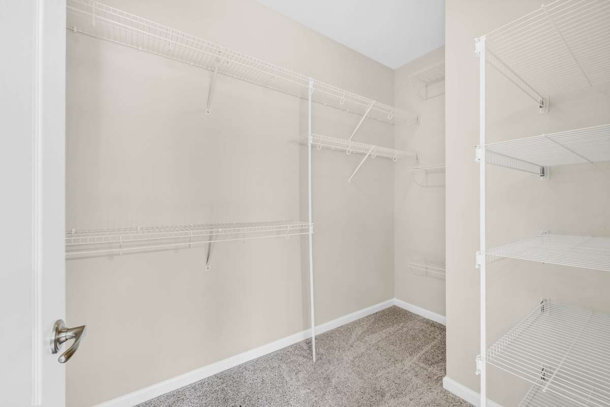 Walk in closet in the primary suite