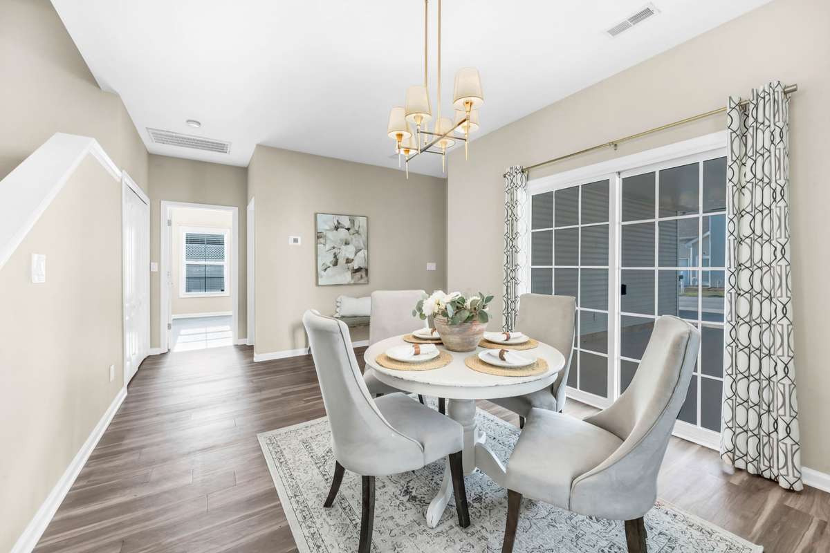 The dining room with a statement light fixture