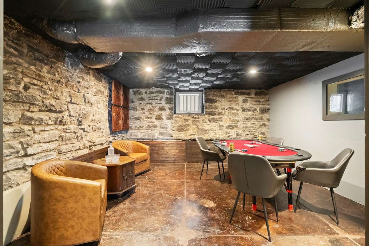 This area, which is the recording studio, is wired and ready to go. The Vocal Booth is the small window to the Right on the wall and is also wired.