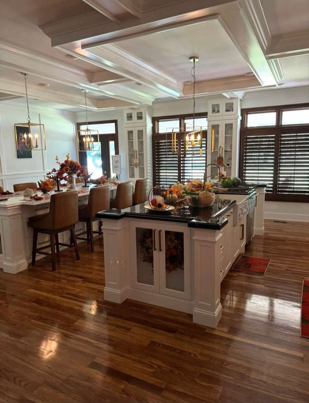 Custom Cabinet Island with Beautiful Farmhouse Sink and Stained Solid Wood Countertop.
