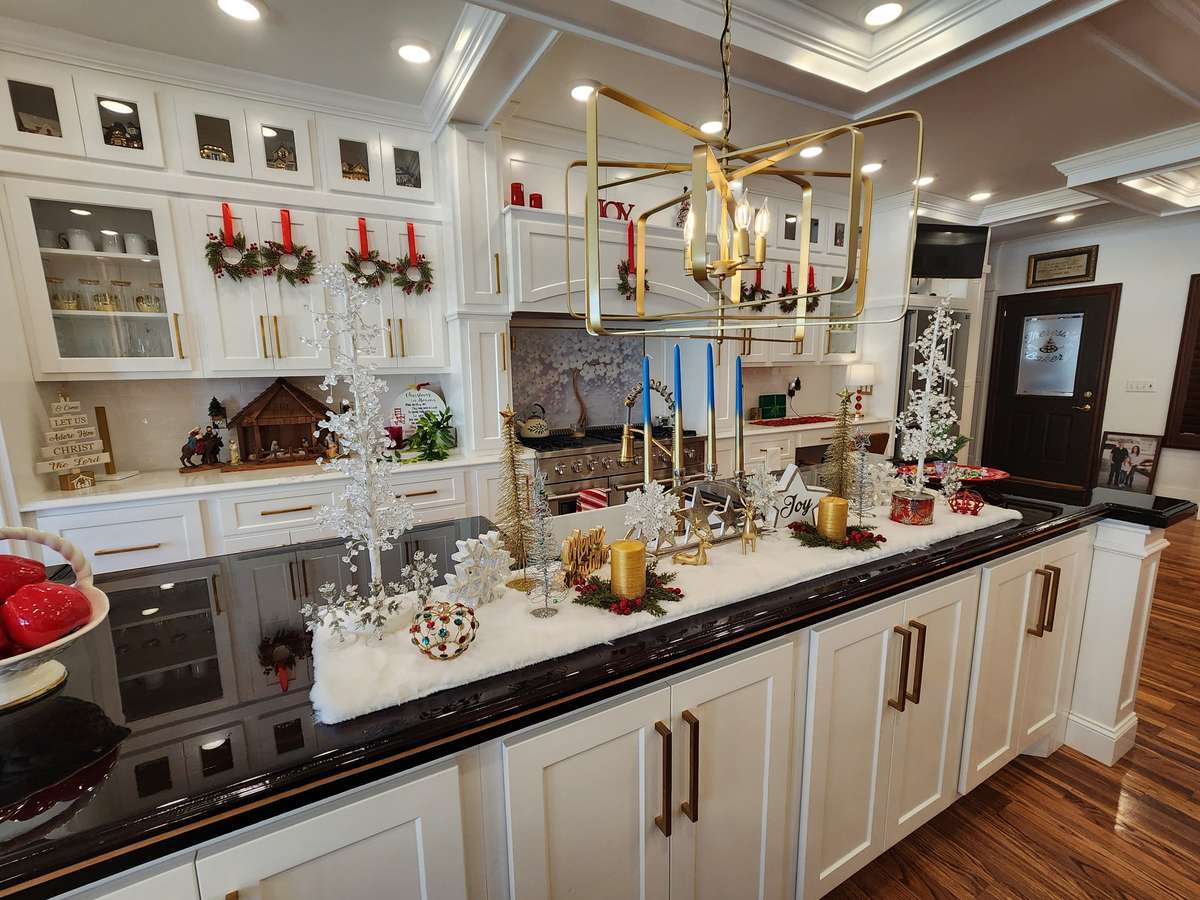 Welcome home to 7488 Lowe Lane.  Gourmet Kitchen has New Top Quality Custom Cabinets, Superior Kitchen Appliances and Two Cabinet Islands!