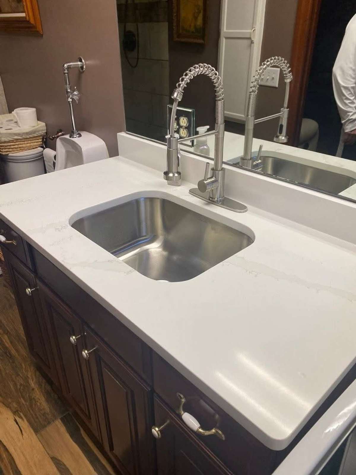 Updated Cabinets, Counter Tops & Faucets in all Bathrooms.