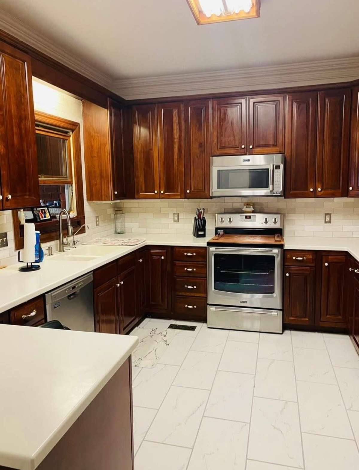 Previous Kitchen is still functional and has Stove, Microwave, Dishwasher and Refrigerator.  Continue to cook and keep food hot in this Kitchen as You Entertain in the New Kitchen!