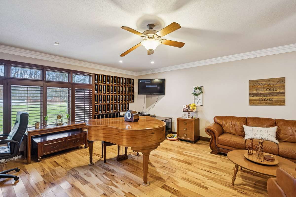 Spacious Living Room has Extra Space for all of Your Furniture, including a Baby Grand Piano.