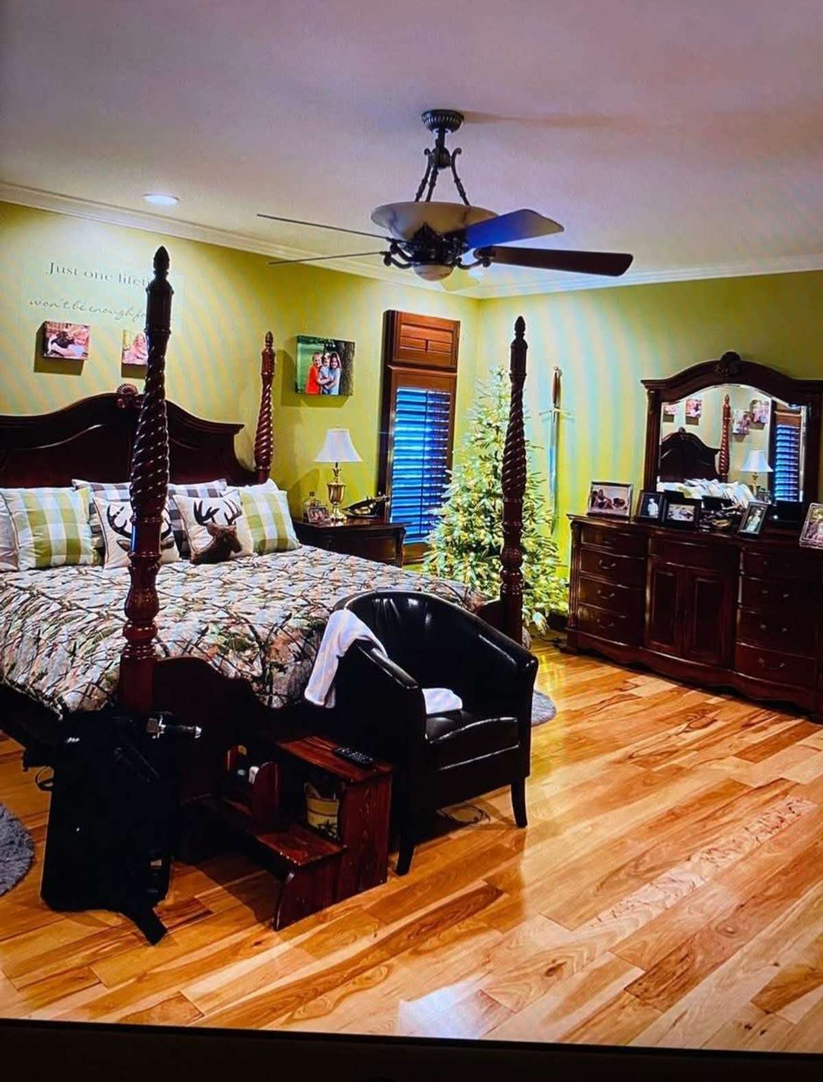 Impressive Primary Bedroom on Main Level with Hardwood Floors will accommodate all of Your Bedroom Furniture.