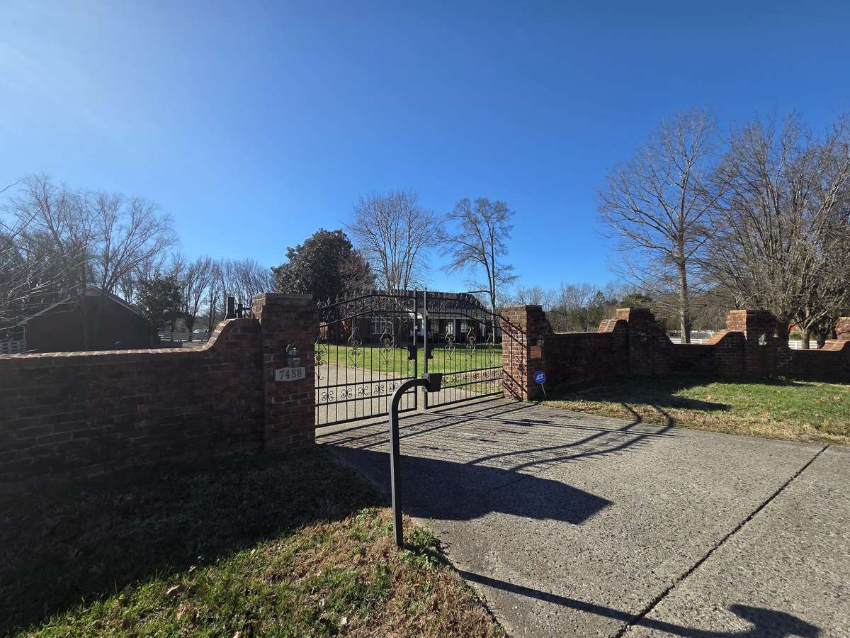 Brick Entrance with Security Gate provides Impressive Entrance and Privacy.