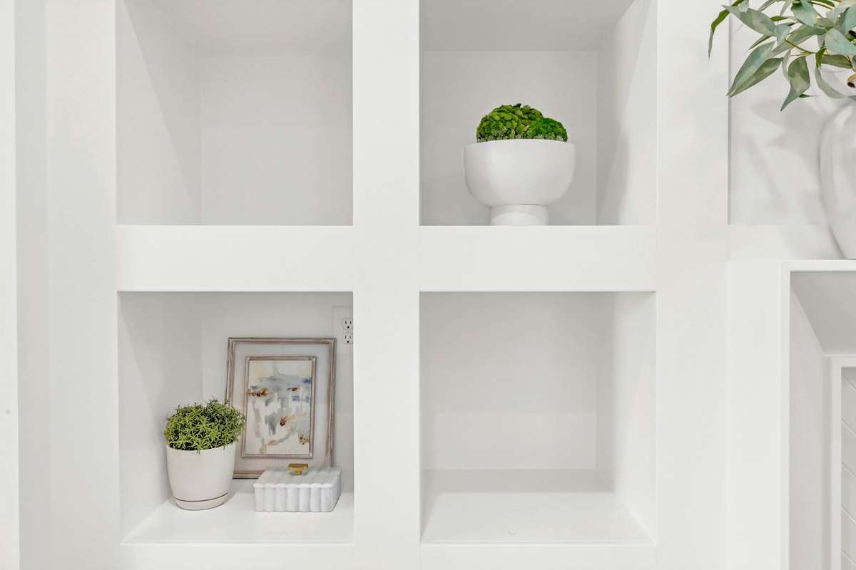 These built ins, no extra furniture needed, showcase it all!