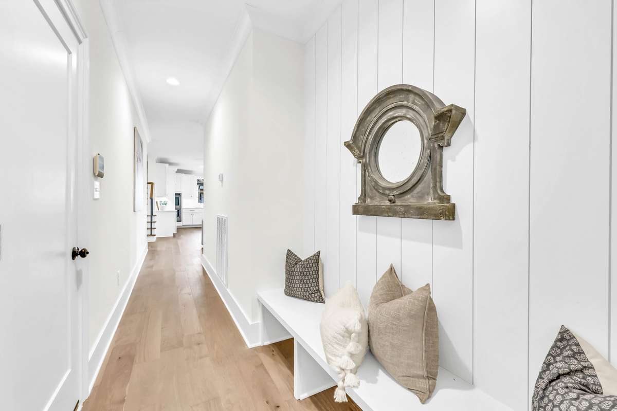 Laundry room also has access from the garage and catch all area