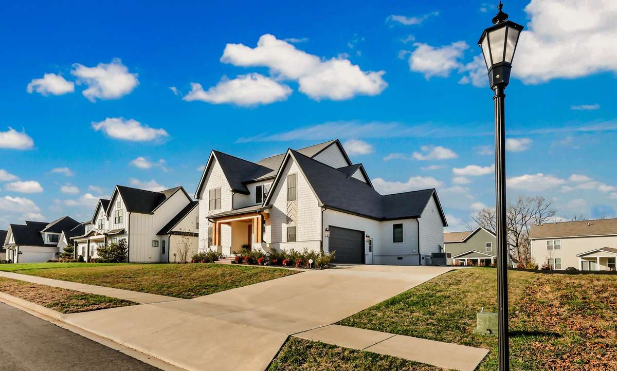 Dunbar Bluff includes sidewalks, underground utilities, & the HOA covers trash pickup!