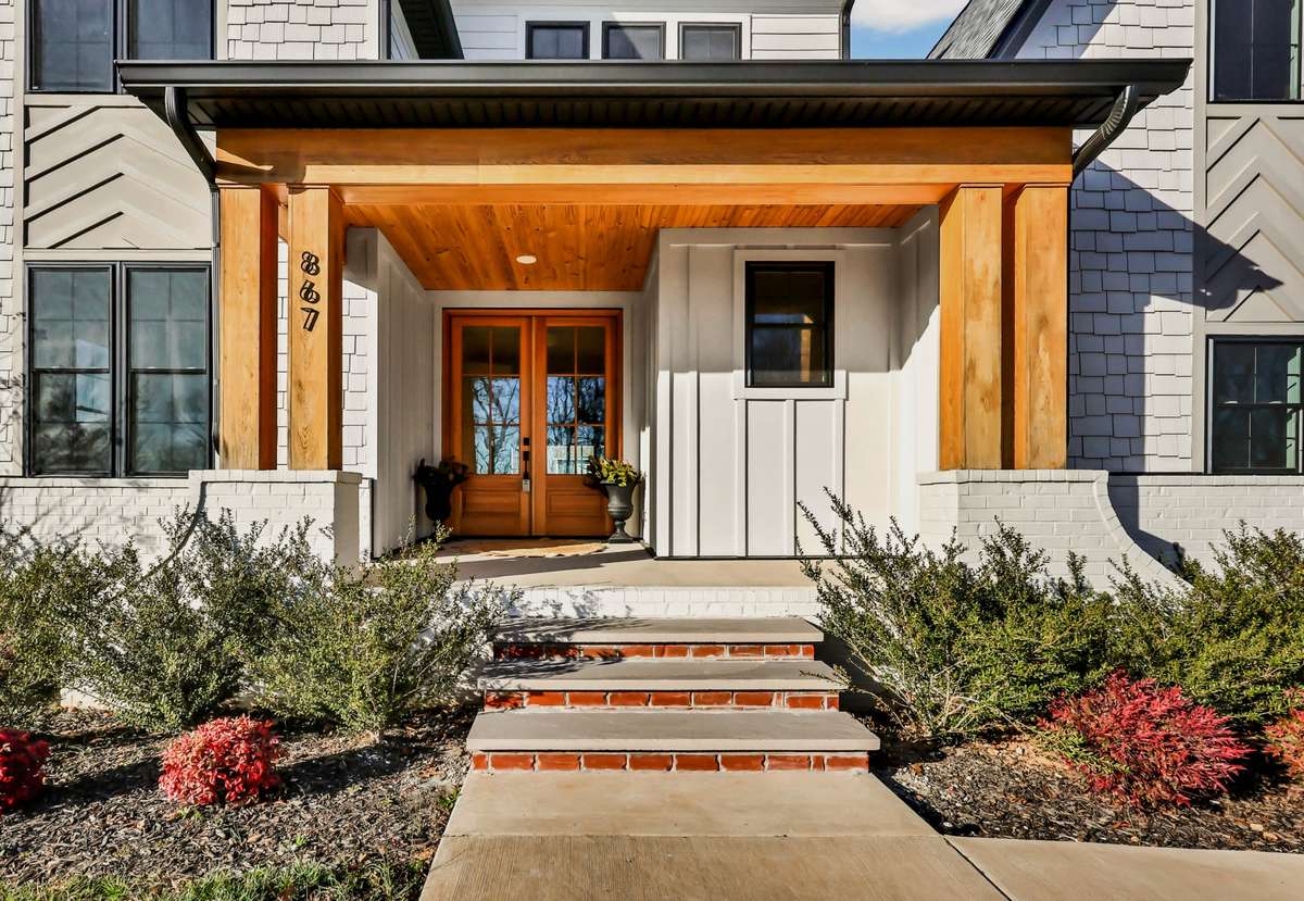 Covered porch with wood accents