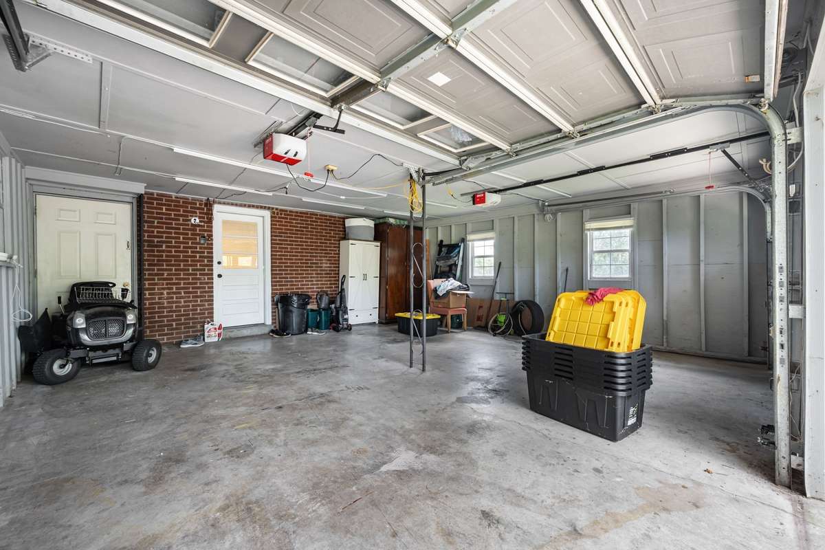 Large two car garage with additional attic storage