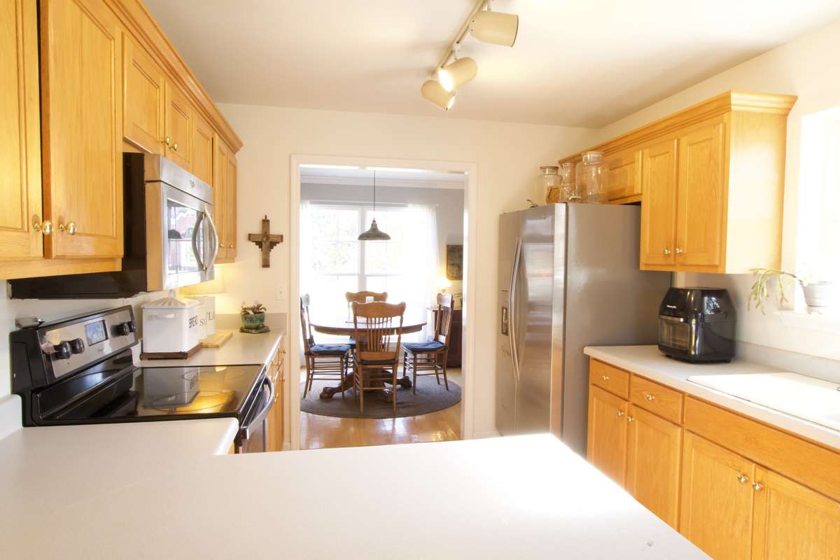 Lots of cabinets and counter space. All kitchen appliances remain.