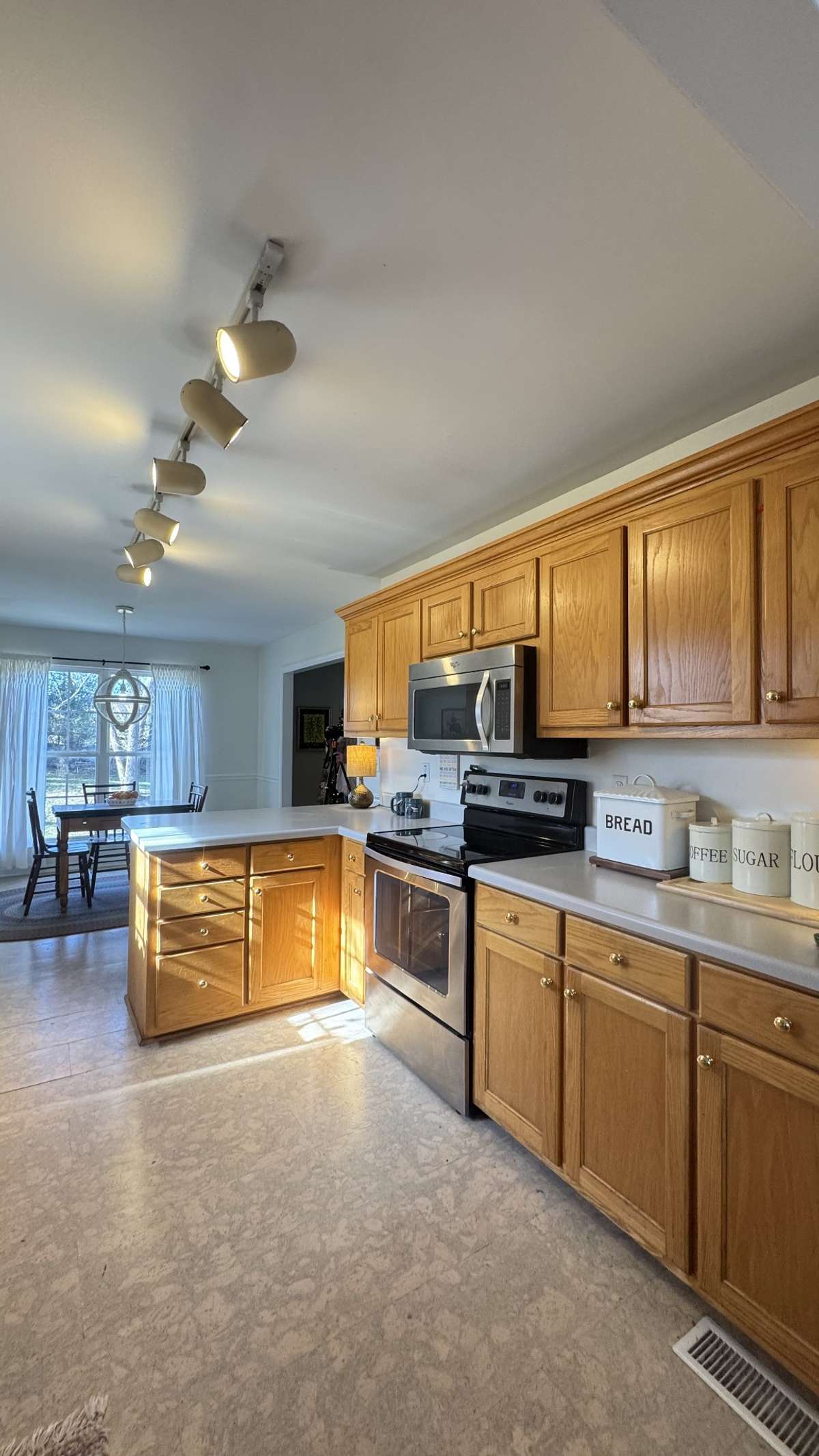 Super nice kitchen with lots of cabinets and counter space!