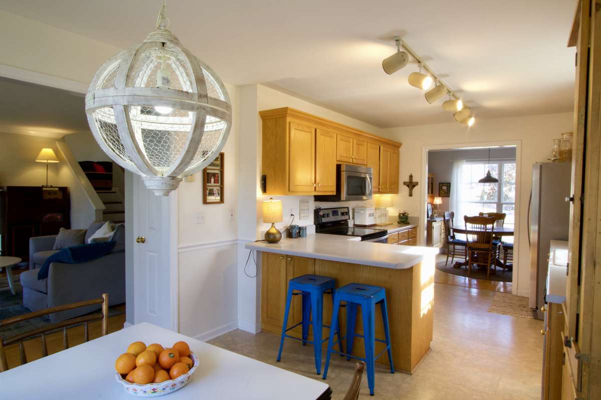 Kitchen not only has a breakfast bar but a breakfast nook!