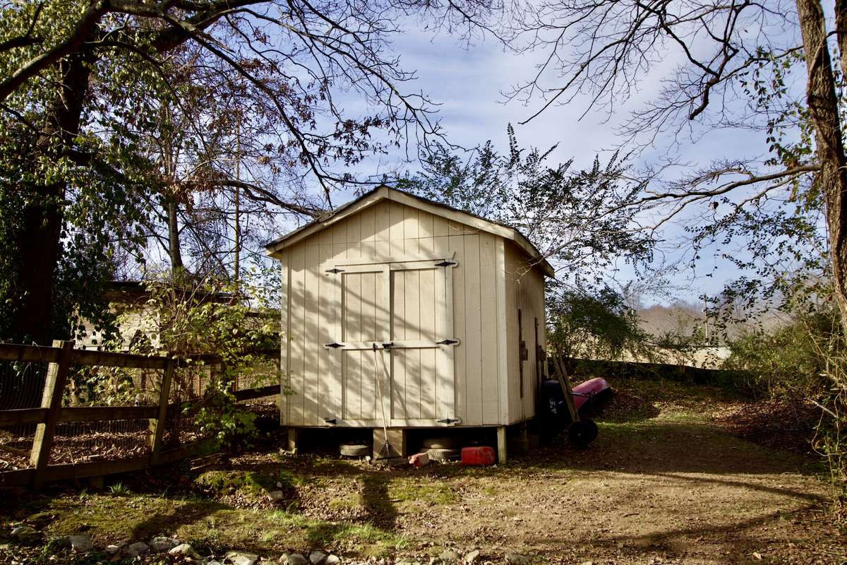 Storage shed remains.