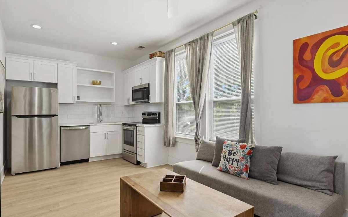 Photos shown reflect Unit B; Unit A is a mirrored layout with comparable finishes, floor plan and features.