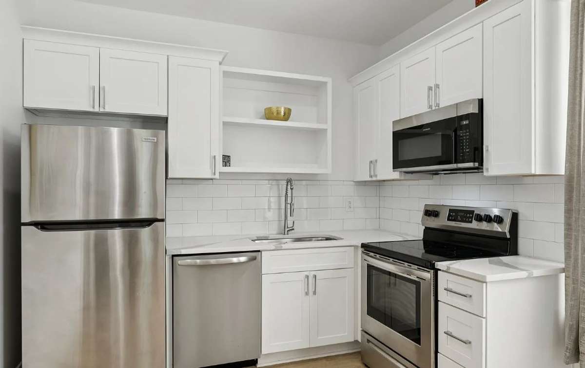 Photos shown reflect Unit B; Unit A is a mirrored layout with comparable finishes, floor plan and features.