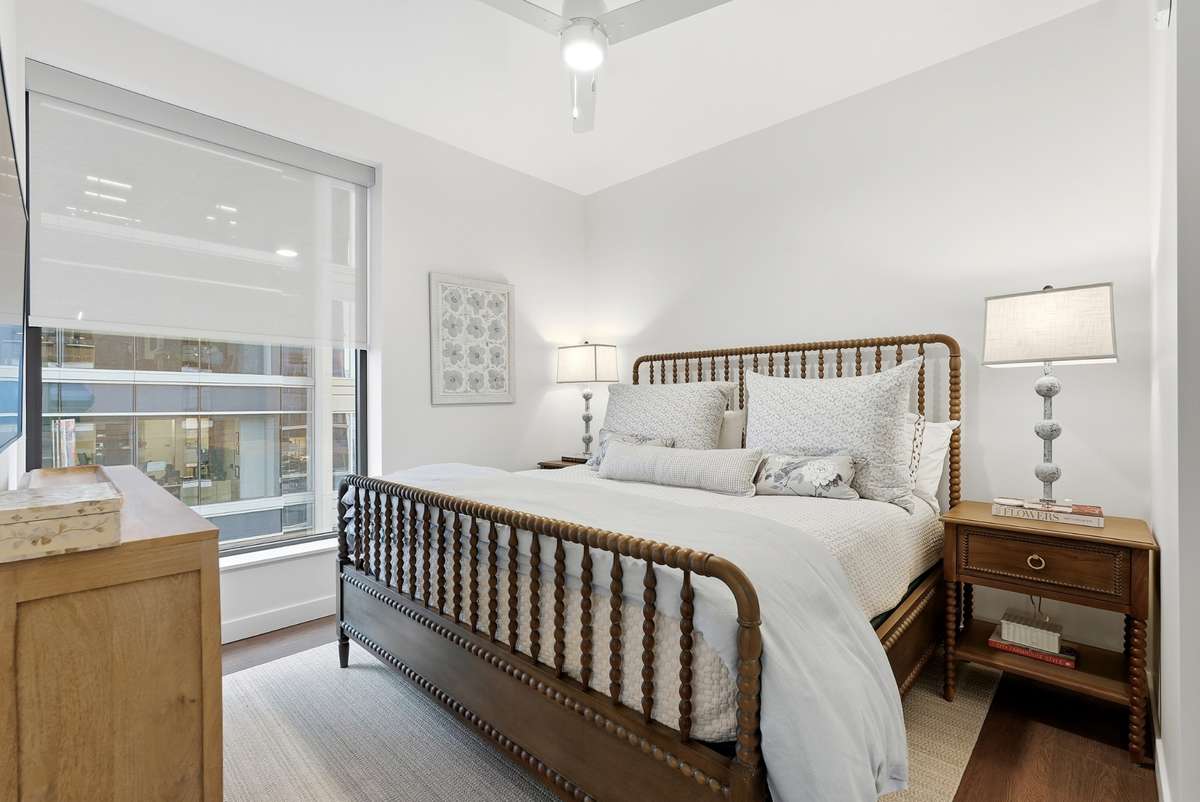 Custom motorized shades in 2nd bedroom included