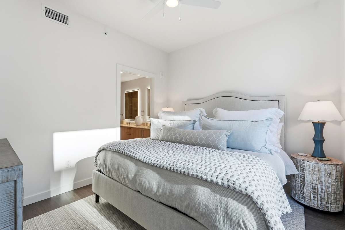 Primary bedroom suite has so much natural light throughout the day.