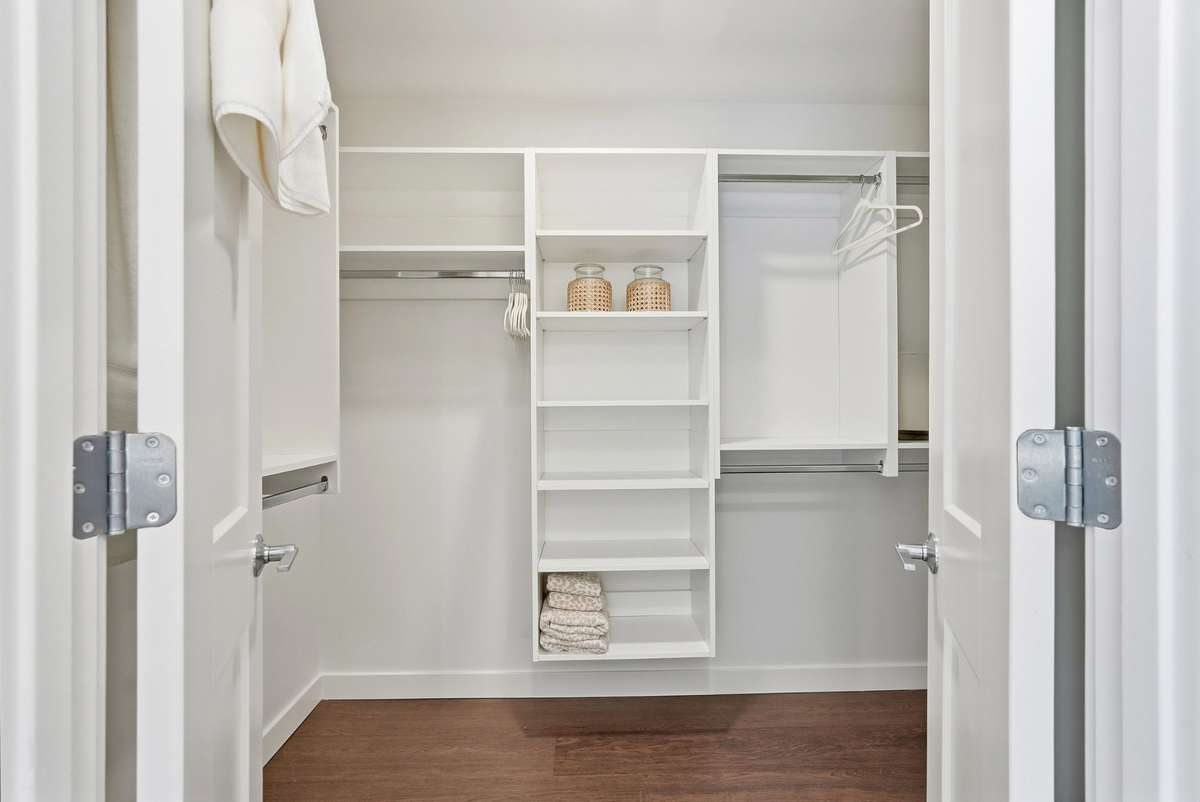 Very large custom closet in primary bedroom