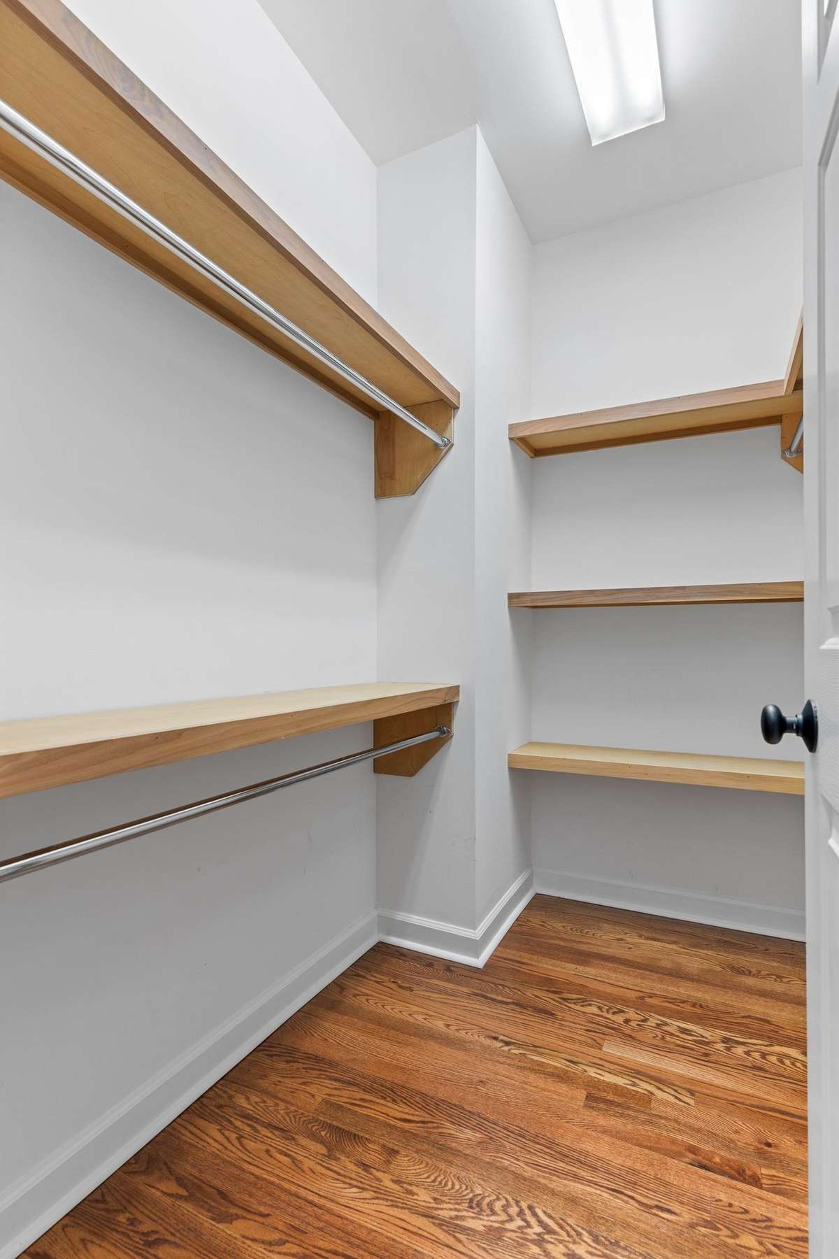 his and her walk in closets in Owner's suite