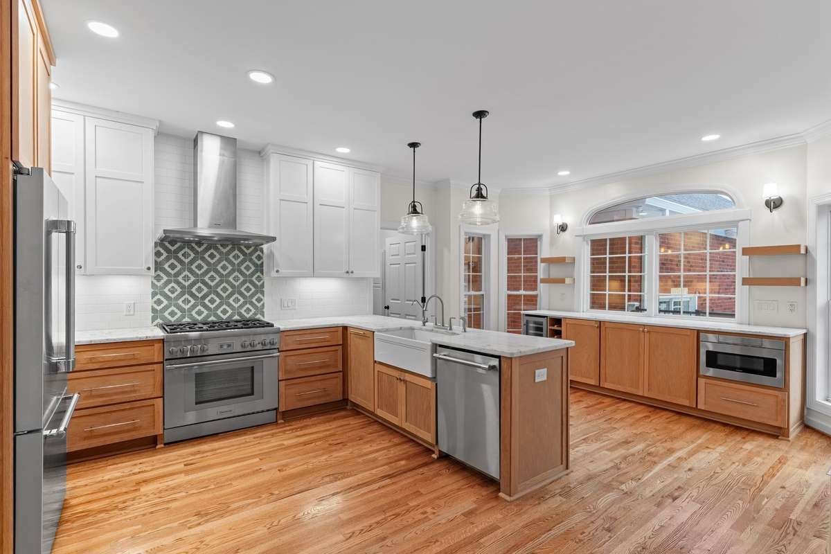 Kitchen was recently completely renovated and has Thermador appliances, marble counter tops, wine fridge and microwave drawer.