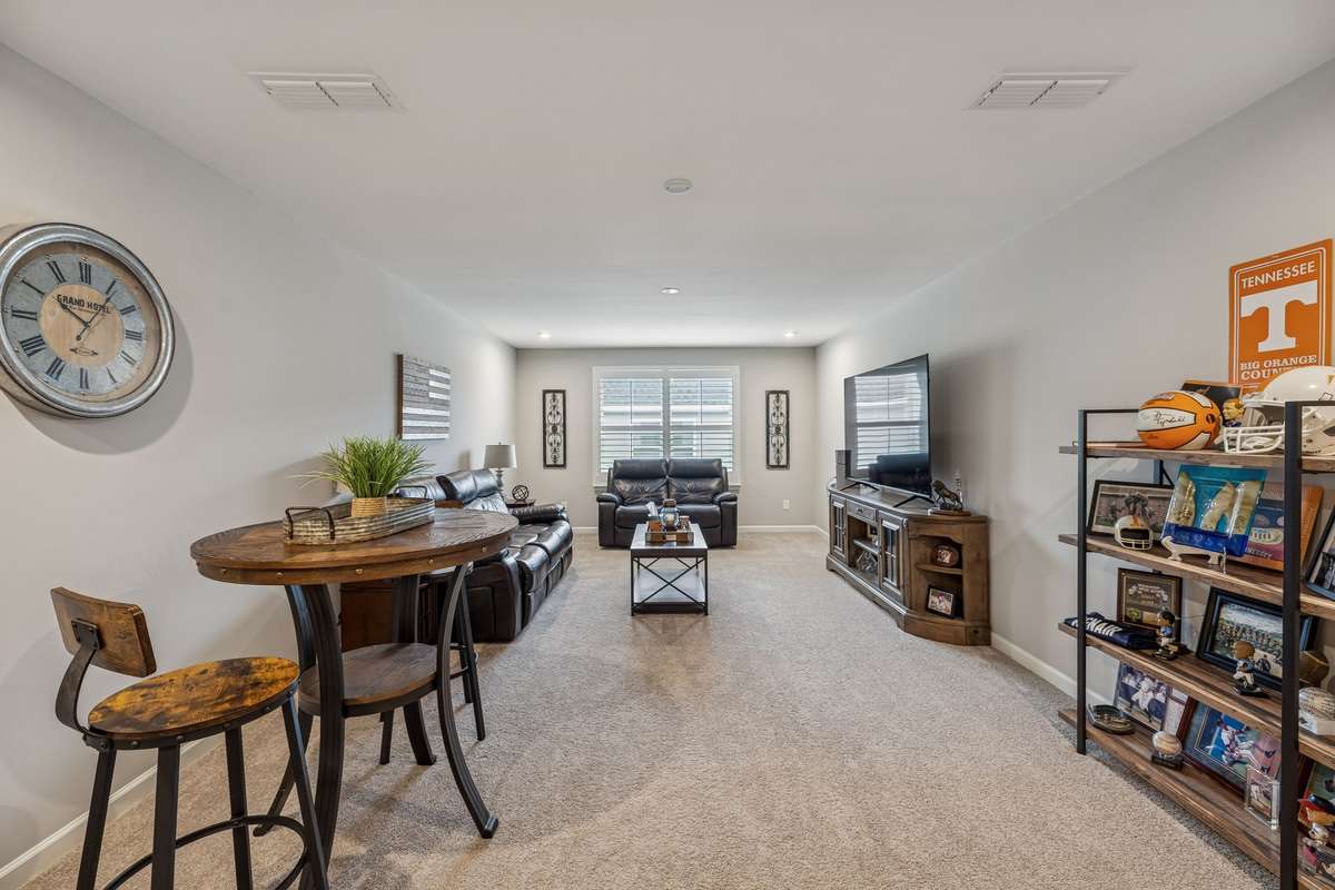 Bonus room/Man cave adds 435 sq ft to floor plan. Check out the ceilings.... no slopes!