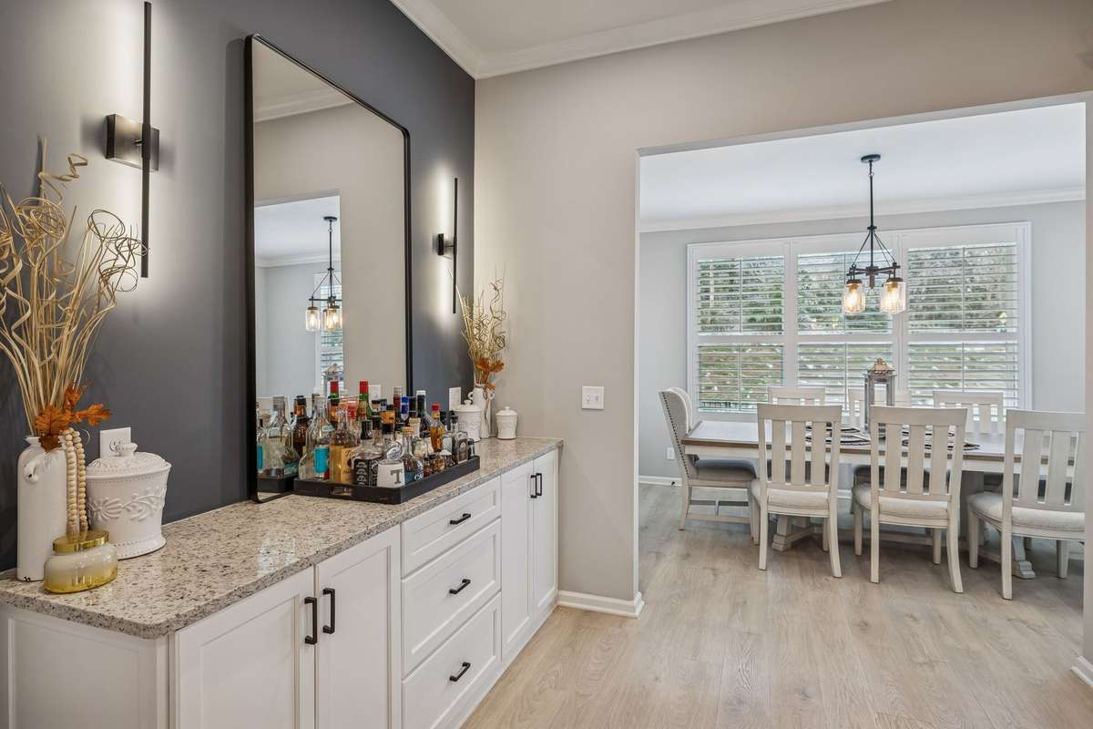 Contractor upgrades: Buffett and formal dinning room. Dinning Rom adds 144 square ft to floor plan