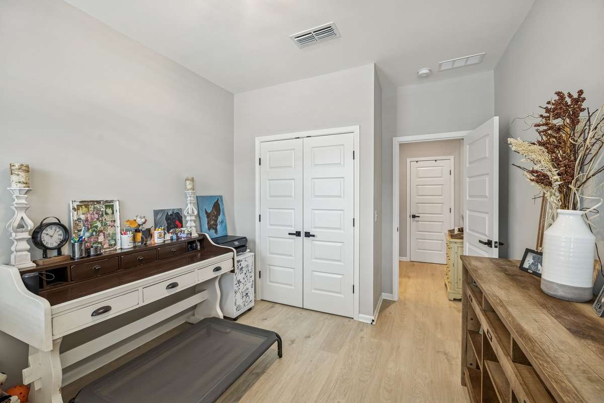 2nd bedroom/ guest room. A queen size bed fits perfectly in this space.