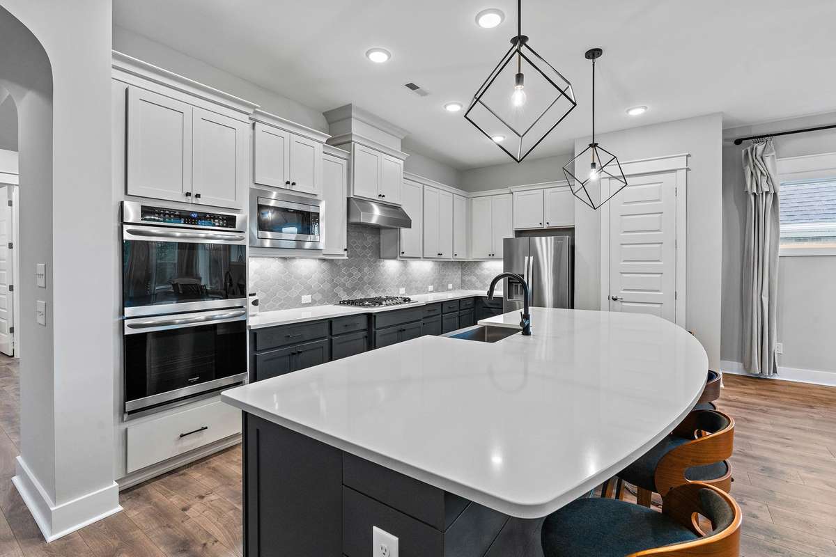 Large kitchen island, double oven, gas burner, two pantries and so much counter/cabinet space