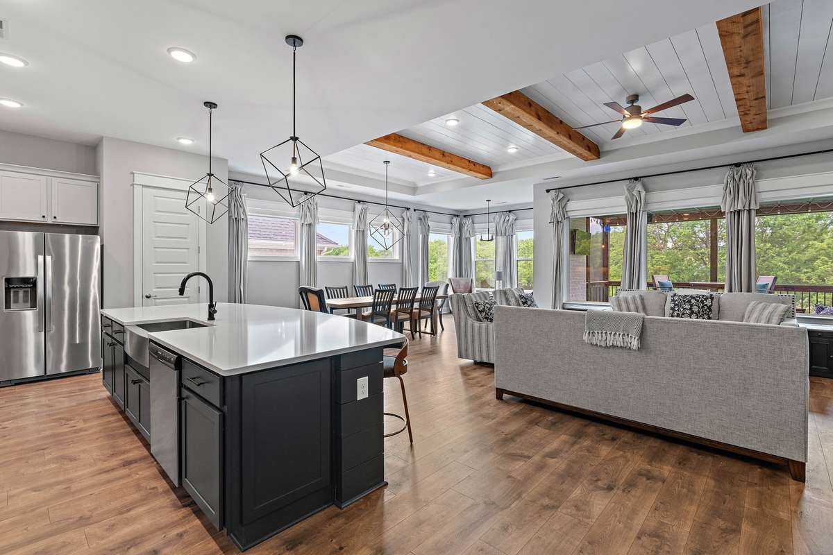 Walking into the large kitchen island and huge living area all connected together