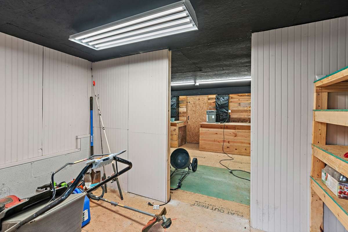 Crawl space workshop. Over 700+ square feet of space for wood working, storage, etc.