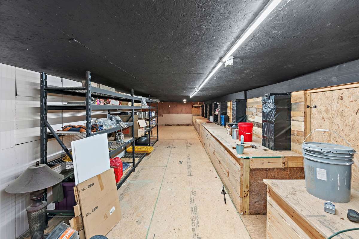 Crawl space workshop. Over 700+ square feet of space for wood working, storage, etc.